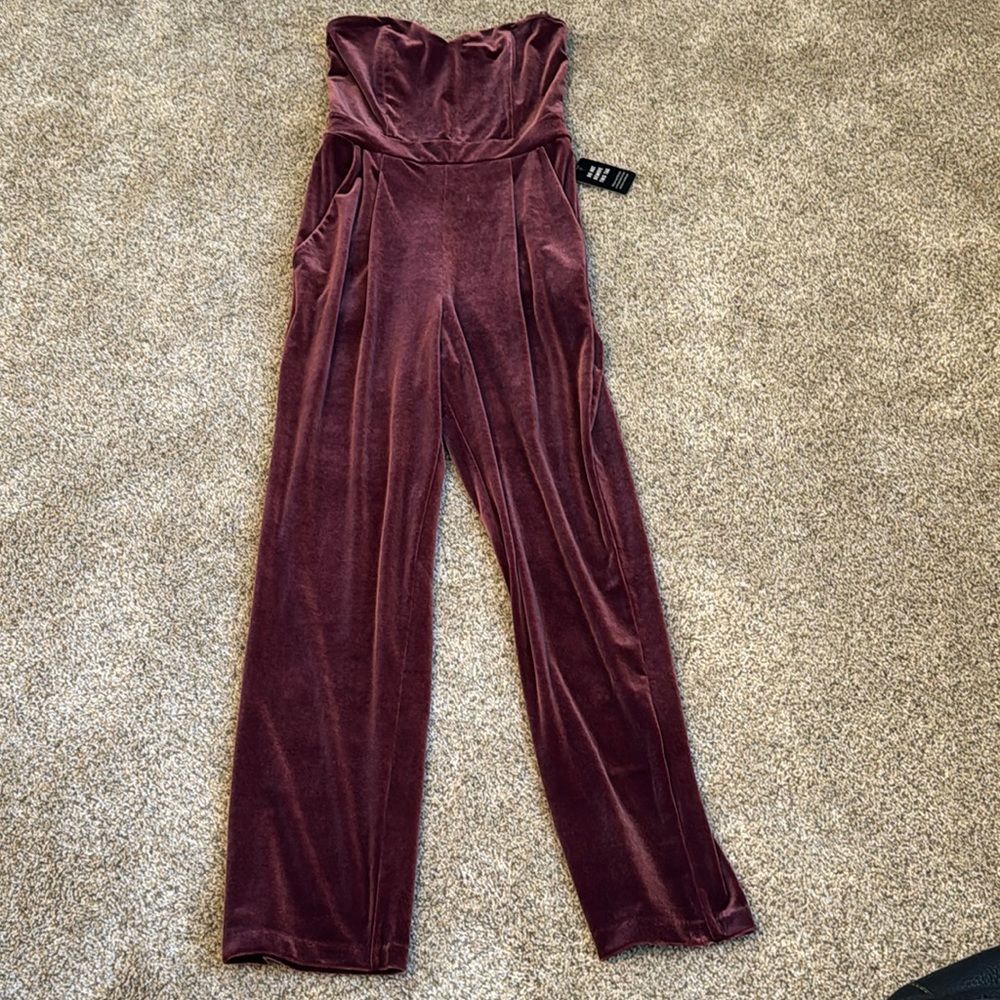 Express jumpsuit in velour . Size 0